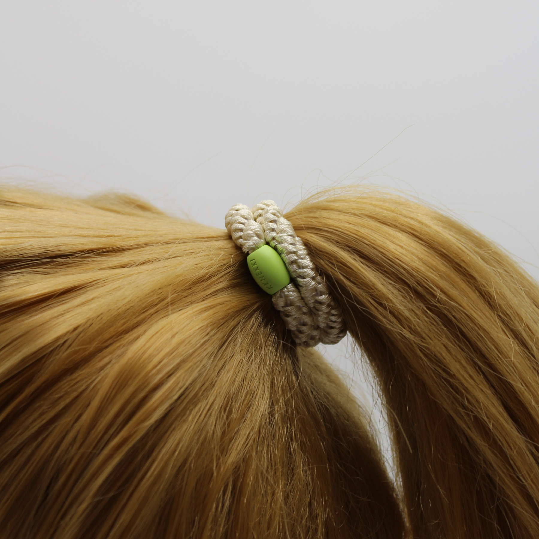 Kknekki Ivory With Green Bead